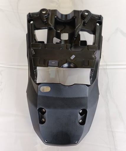 [61303-K0E-D00] "CUBIERTA, TRAS. FARO"